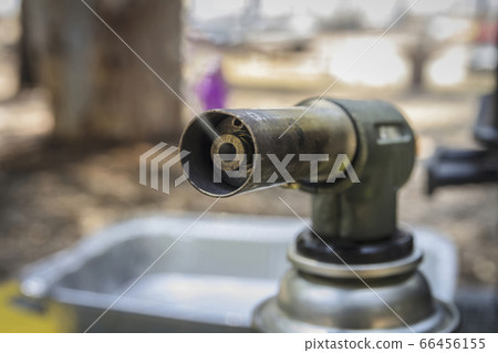 Smoke emitted from a manual gas burner 66456155