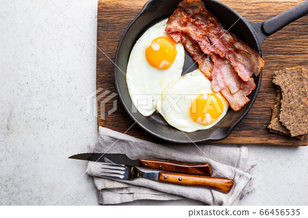 Fried eggs and bacon Fried eggs and bacon 66456535