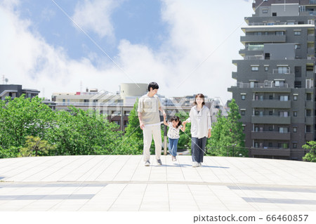 Parents and children holding hands and taking a walk outdoors (new lifestyle image) Parents and children holding hands and taking a walk outdoors (new lifestyle image) 66460857
