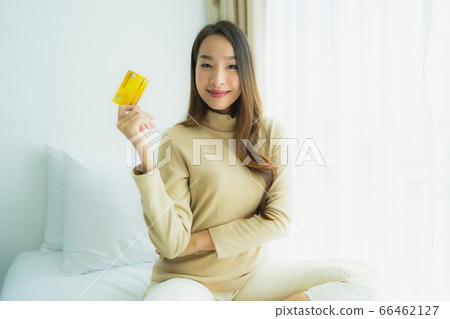 women happy smile relax with cocktails glass around outdoor swimming pool in hotel resort 66462127