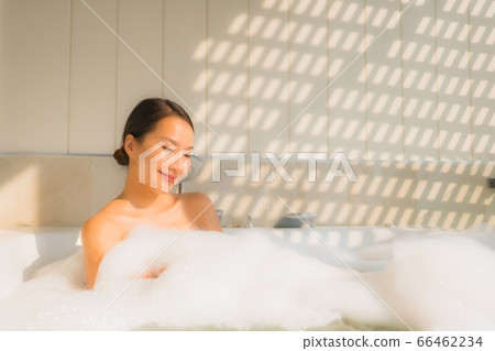 women using computer laptop or smart and mobile phone with credit card for online shopping 66462234