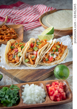 mexican shredded chicken tacos with ingredients 66462845