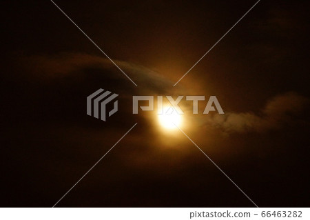 A night sky with the sun behind them 66463282