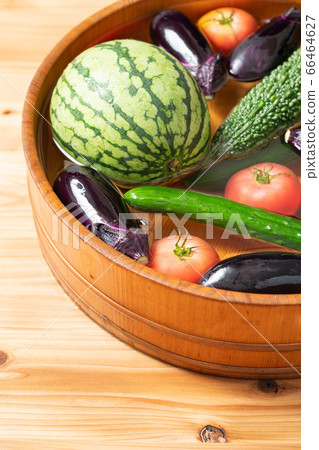 Cool summer vegetables in a tub Cool summer vegetables in a tub 66464627