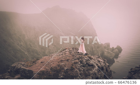 beautiful young girl in the morning under the 66476136