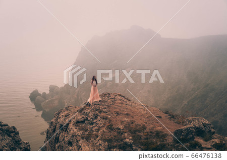beautiful young girl in the morning under the 66476138
