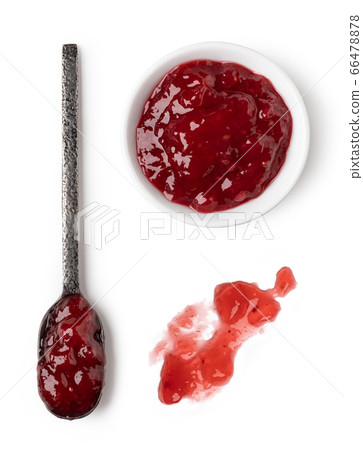 Small glass bowl and spoon of red berry jam Small glass bowl and spoon of red berry jam 66478878