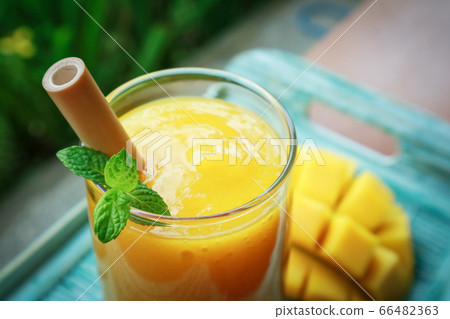 Mango smoothie in glass 66482363