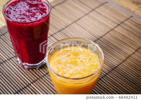 Dragon fruit, papaya and mango smoothies 66482411