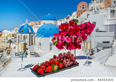 Wine and fruit on the table for two Wine and fruit on the table for two 66483009