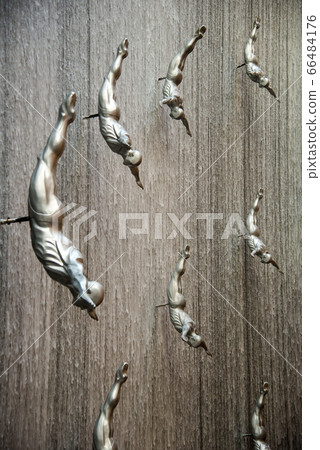Flying men at the waterfall in the Dubai Mall Flying men at the waterfall in the Dubai Mall 66484176