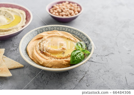 Bowls with different kinds hummus Bowls with different kinds hummus 66484306