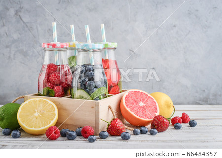 Infused water with fresh fruits Infused water with fresh fruits 66484357