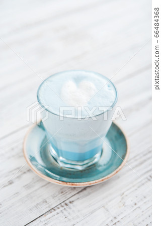 Blue matcha latte in glass Blue matcha latte in glass 66484368