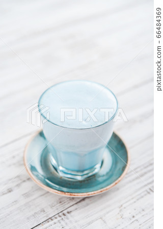 Blue matcha latte in glass Blue matcha latte in glass 66484369