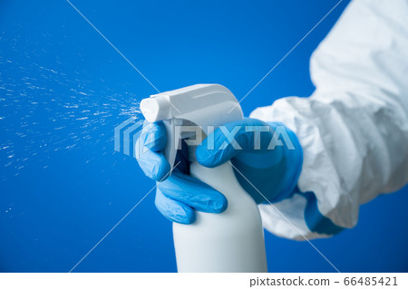 Person wearing protective clothing Person wearing protective clothing 66485421