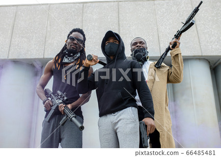 three black men with guns ready to shoot if discrimination does not stop three black men with guns ready to shoot if discrimination does not stop 66485481