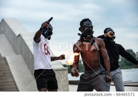 three dark-skinned people oppose anti-racism three dark-skinned people oppose anti-racism 66485571