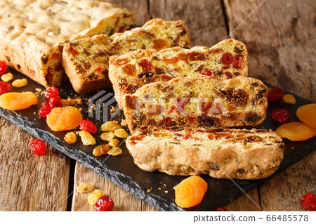 Traditional fruit cake with dried apricots berries 66485578