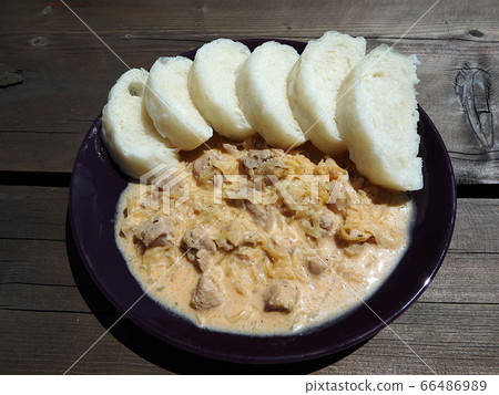 Pork, dumplings, cabbage. Pork, dumplings, cabbage. 66486989