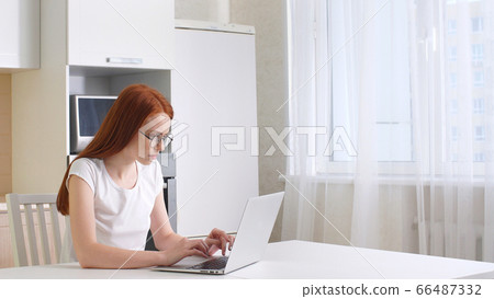 Frustrated woman working from home on her computer Frustrated woman working from home on her computer 66487332
