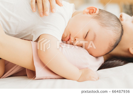 Mother and son, sleeping, bedroom Mother and son, sleeping, bedroom 66487936
