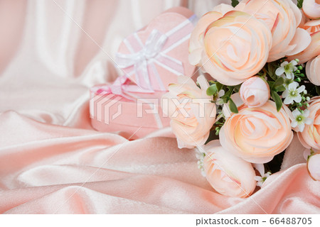 Pink composition with flowers and gift box Pink composition with flowers and gift box 66488705