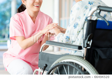 Care senior woman hospital helper carer 66494320