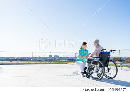 Care senior woman hospital helper carer 66494371