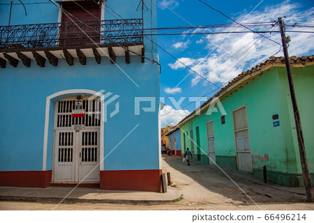 Exterior of a colorful Casa (private night) on the street corner of Trinidad, Cuba 66496214
