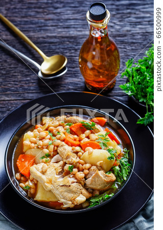 white bean, vegetables pork stew in a bowl white bean, vegetables pork stew in a bowl 66500999