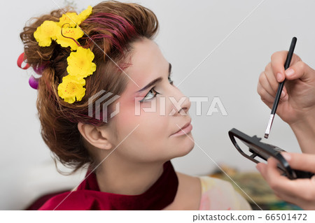 Portrait of a beautiful woman in beauty salon 66501472