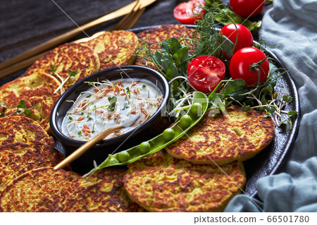 close-up of green pea and oatmeal pancakes 66501780
