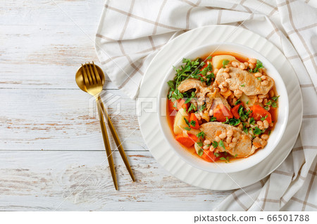 white bean, vegetables pork stew in a bowl white bean, vegetables pork stew in a bowl 66501788