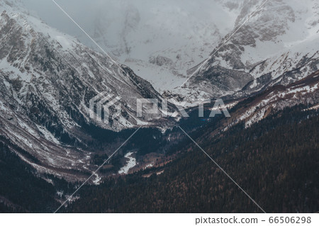 High mountains under snow in the winter High mountains under snow in the winter 66506298