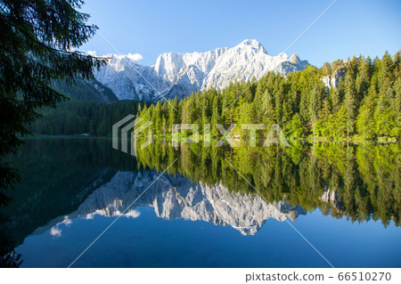 Beautiful morning scene with alpine peaks at sunrise Beautiful morning scene with alpine peaks at sunrise 66510270