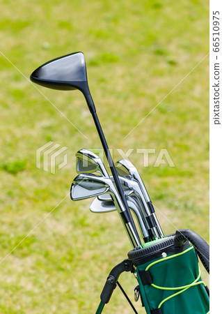 Of golf courses and golf clubs with beautiful green grass 66510975