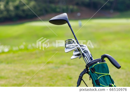 Of golf courses and golf clubs with beautiful green grass 66510976