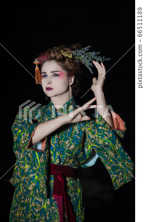 European woman in Geisha kimono 66511189