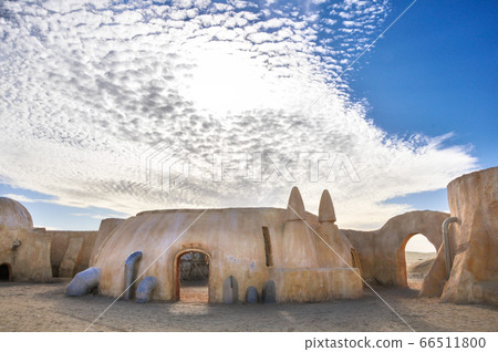 Chott el Jerid, Sahara desert, Nefta, TUNISIA - February 04, 2009: The houses from planet Tatouine - Star Wars film set. 66511800