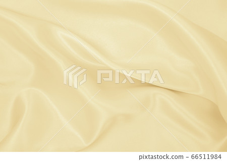 Smooth elegant golden silk or satin luxury cloth Smooth elegant golden silk or satin luxury cloth 66511984