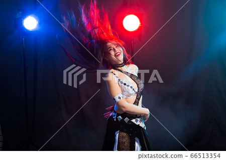 Spirituality dance. Beautiful sexy woman with luxury glossy eastern make-up dancing tribal fusion. Belly dance. Spirituality dance. Beautiful sexy woman with luxury glossy eastern make-up dancing tribal fusion. Belly dance. 66513354