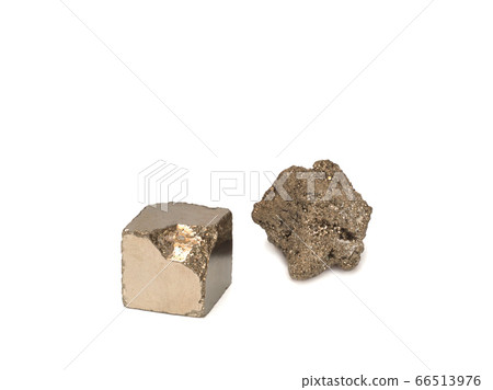 Natural Pyrite and partially treated pyrite on white background 66513976
