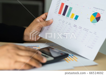 Asian accountant working and analyzing financial reports project Asian accountant working and analyzing financial reports project 66514692
