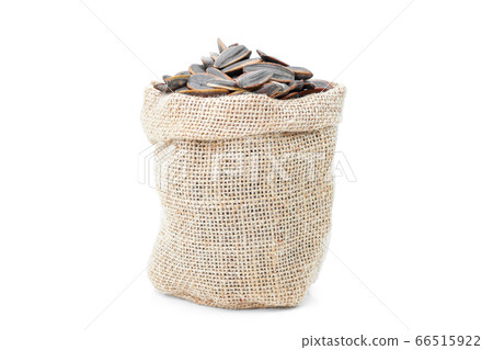Sunflower seeds in sack on a white background 66515922