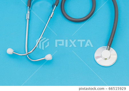 Medical stethoscope on a blue background Medical stethoscope on a blue background 66515929