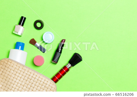Aerial view of a leather cosmetics bag with make Aerial view of a leather cosmetics bag with make 66516206