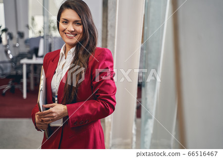 Young attractive female person posing on camera Young attractive female person posing on camera 66516467