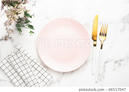 Table Setting Empty Plate And Golden Cutlery 66517047