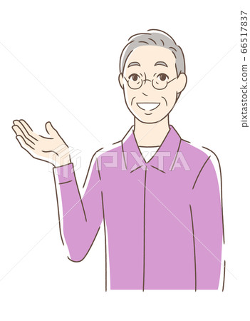 A man smiling and holding out his palm A man smiling and holding out his palm 66517837
